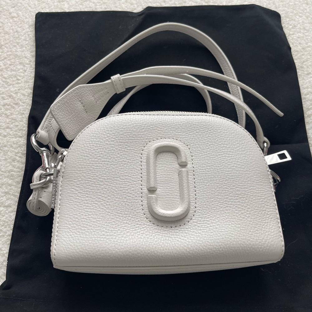 White crossbody bag.